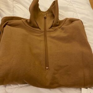 NWT and in packaging. Beyond yoga top. Size medium